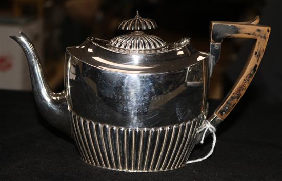 A silver oval teapot, half-fluted, London 1903, Carrington & Co